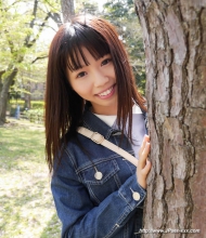 Japanese Schoolgirl Hinako hiding behind tree