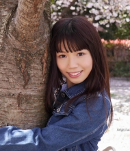 Japanese Schoolgirl Hinako hugs a tree